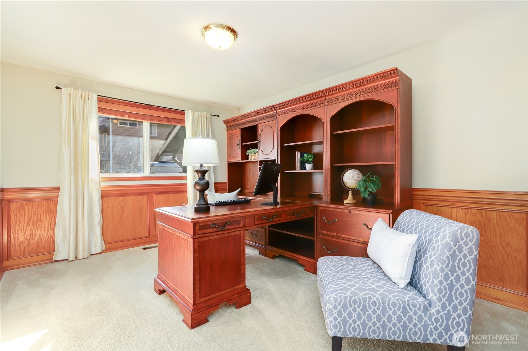 6405 154th Street Southeast Snohomish, WA 98296 - Photo 16 of 39 a living room with furniture a rug and a window