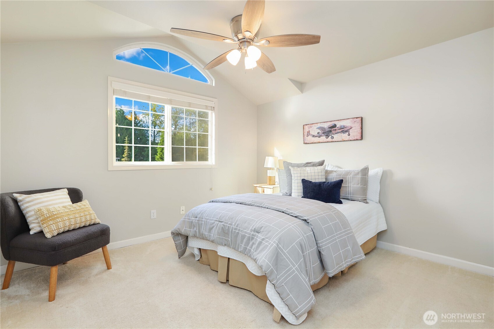 6405 154th Street Southeast Snohomish, WA 98296 - Photo 26 of 39 a bedroom with a bed and a couch