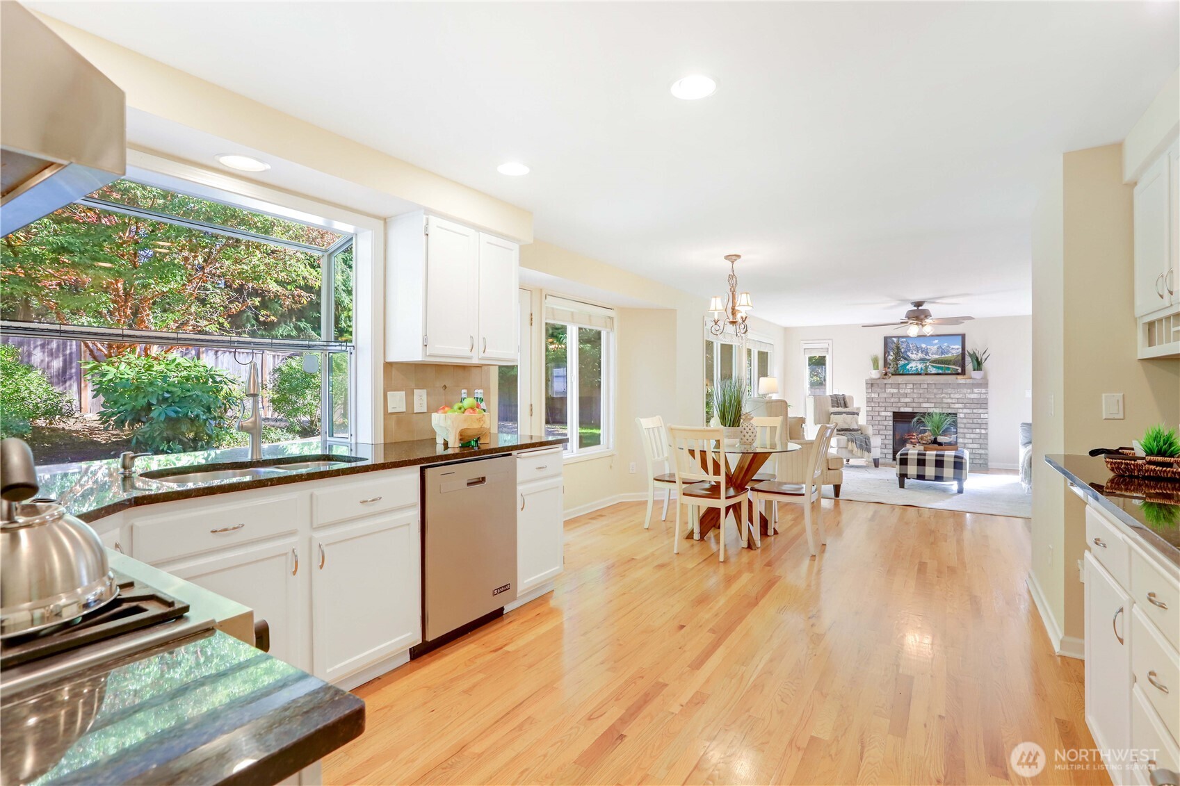 6405 154th Street Southeast Snohomish, WA 98296 - Photo 8 of 39 a living room with furniture and a wooden floor