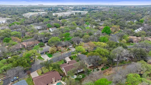 an aerial view of a city with lots of residential buildings