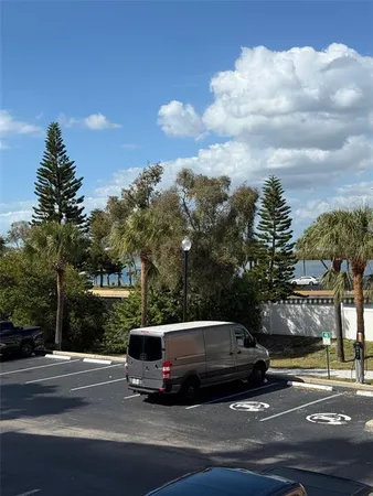 a bedroom with a bed and a bathroom