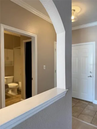 a view of a livingroom with a staircase