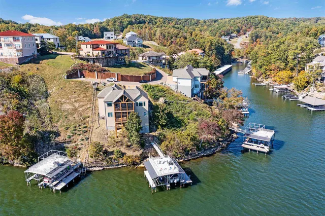 an aerial view of a house with a garden
