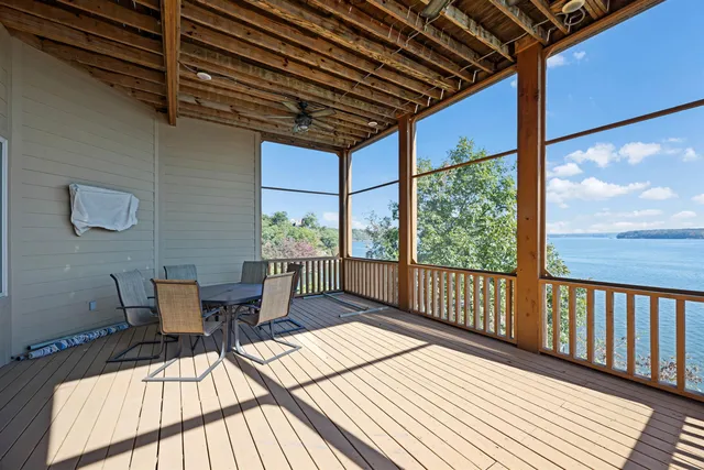a balcony with wooden floor