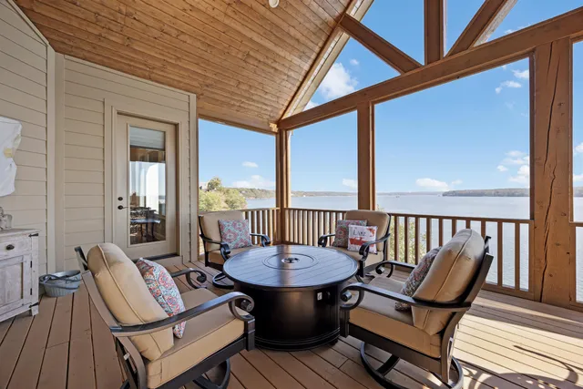 a view of a balcony with furniture