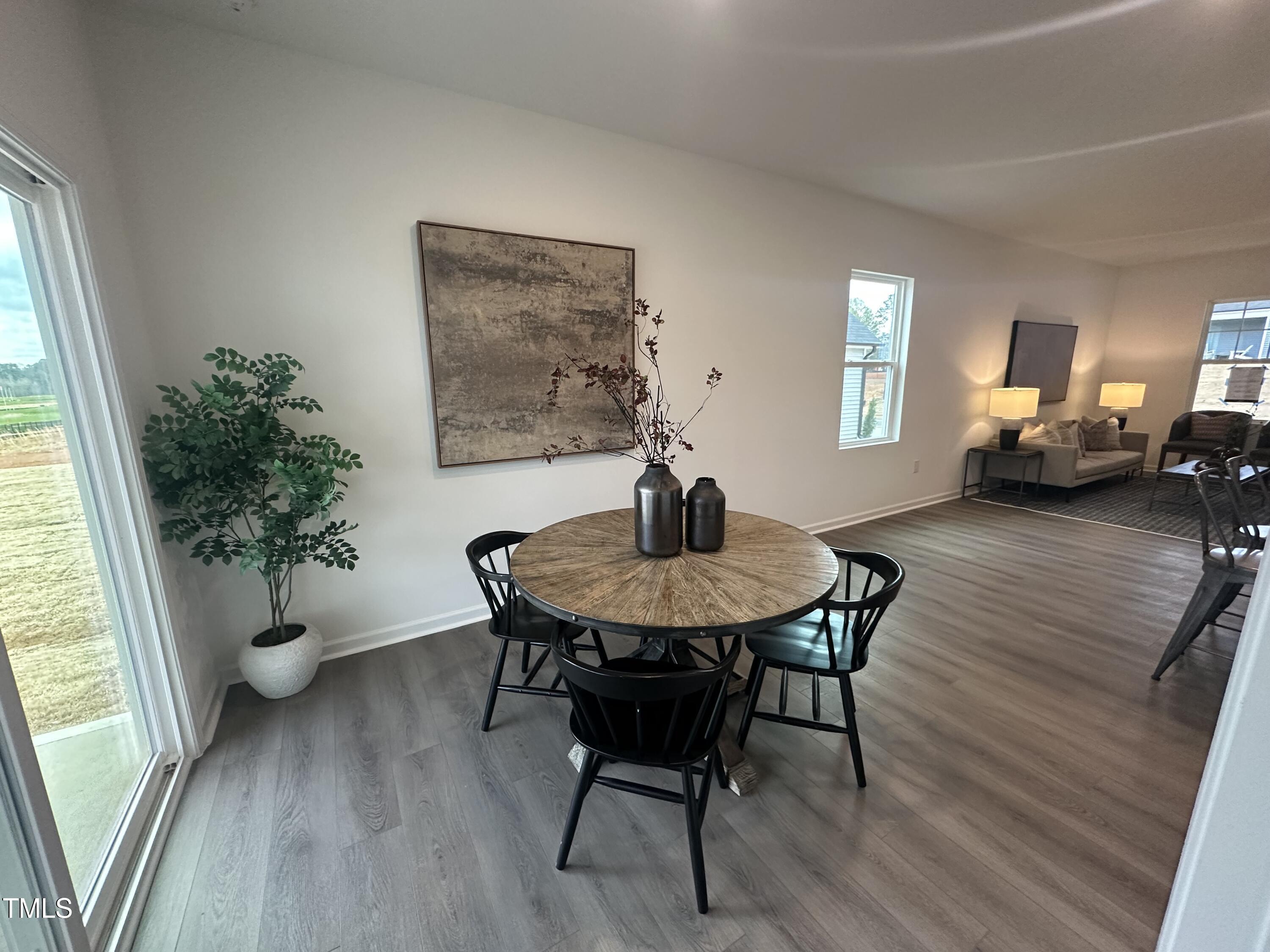 11198 Salers Loop Middlesex, NC 27557 - Photo 18 of 34 a living room with furniture and a window