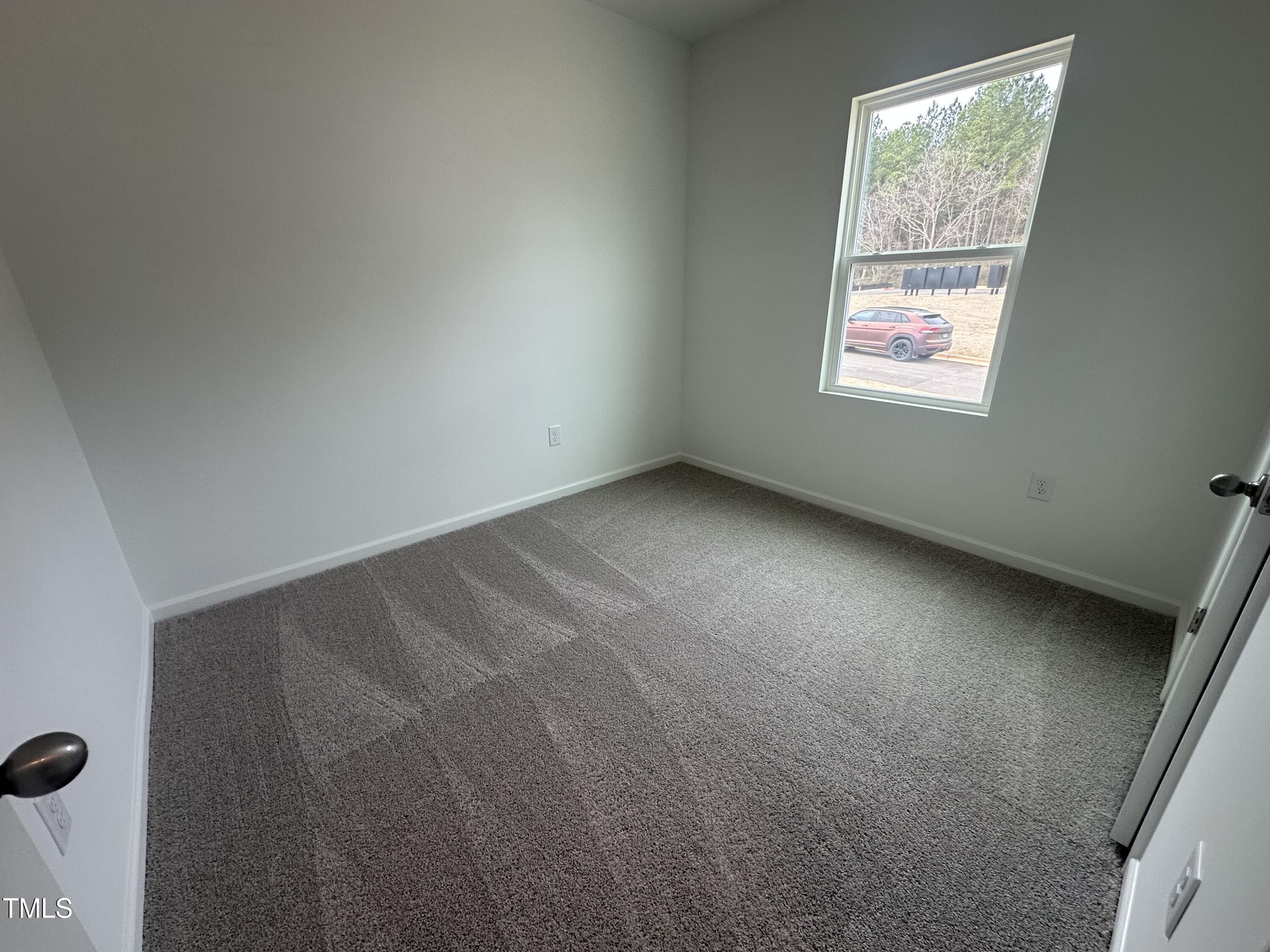 11198 Salers Loop Middlesex, NC 27557 - Photo 22 of 34 an empty room with windows