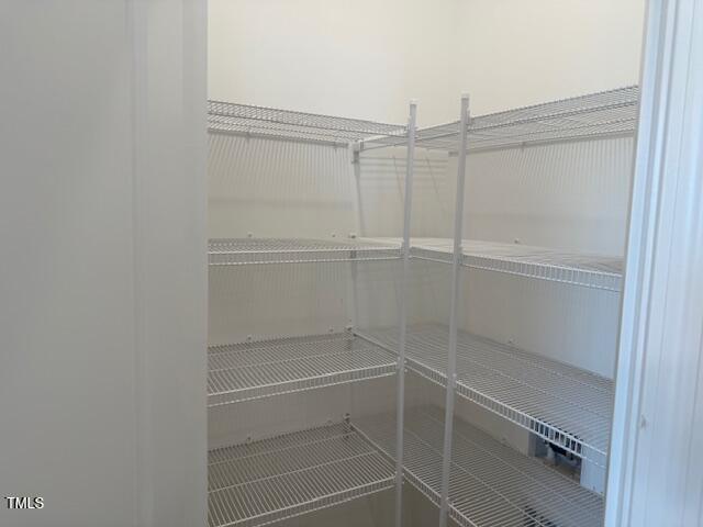 11198 Salers Loop Middlesex, NC 27557 - Photo 5 of 34 a view of an empty walk in closet