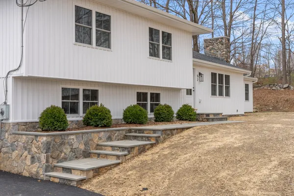 a view of outdoor space yard and front view of a house
