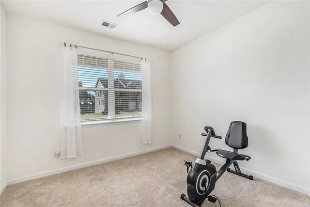 a view of workspace with gym equipment