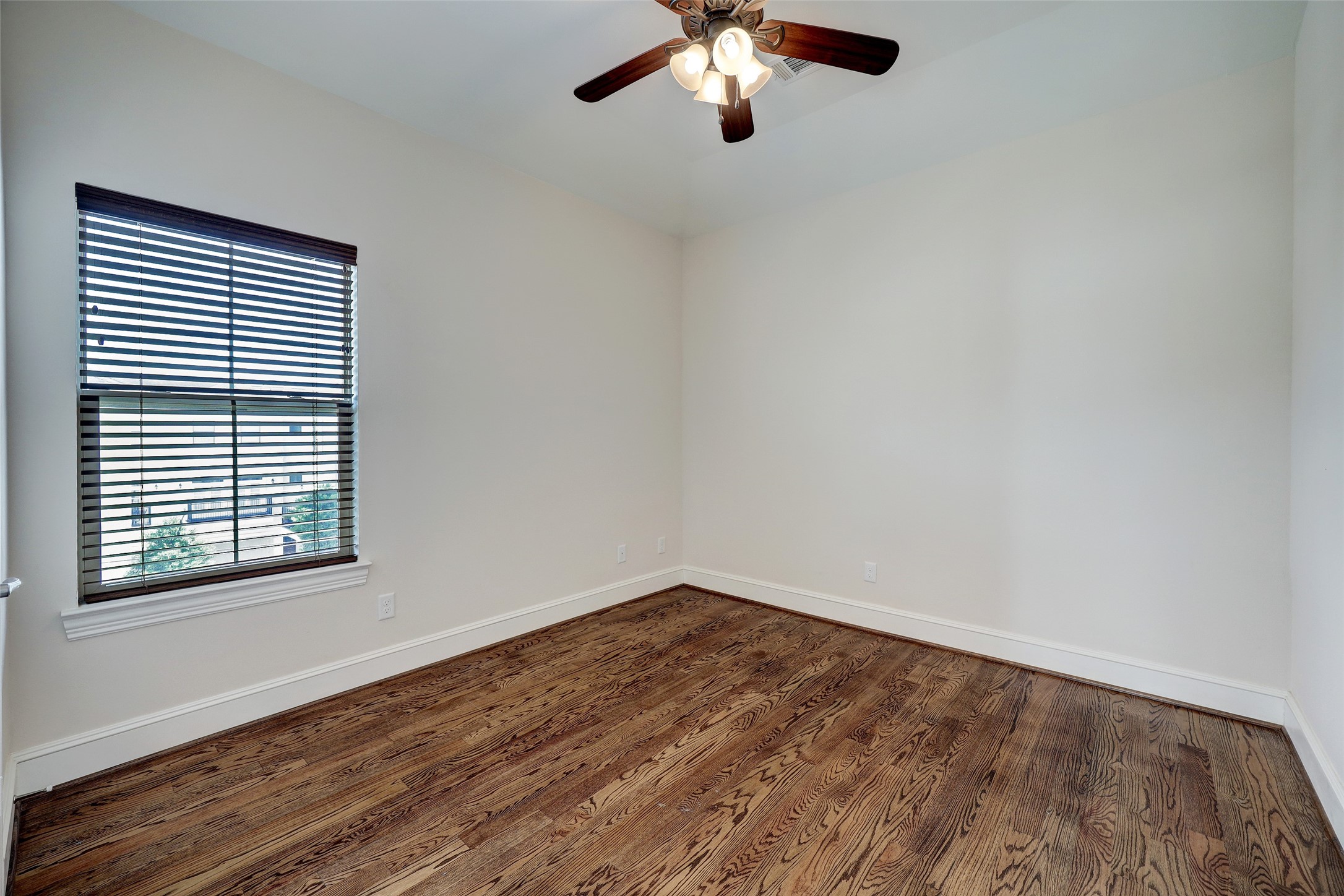 2401 Radcliffe Street Houston, TX 77007 - Photo 17 of 19 One of 4 bedrooms located on the third floor. This home really has space for everyone.