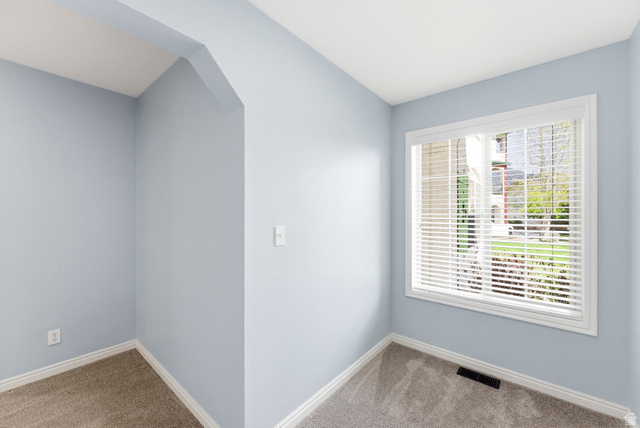 1041 West Grindelwald Court, Unit R5 Midway, UT 84049 - Photo 24 of 44 A spacious bedroom with a connected open area that adds versatility for work, hobbies, or extra storage.
