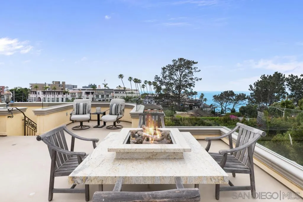 7971 Prospect Place La Jolla, CA 92037 - Photo 1 of 36 a view of a patio with couches table and chairs