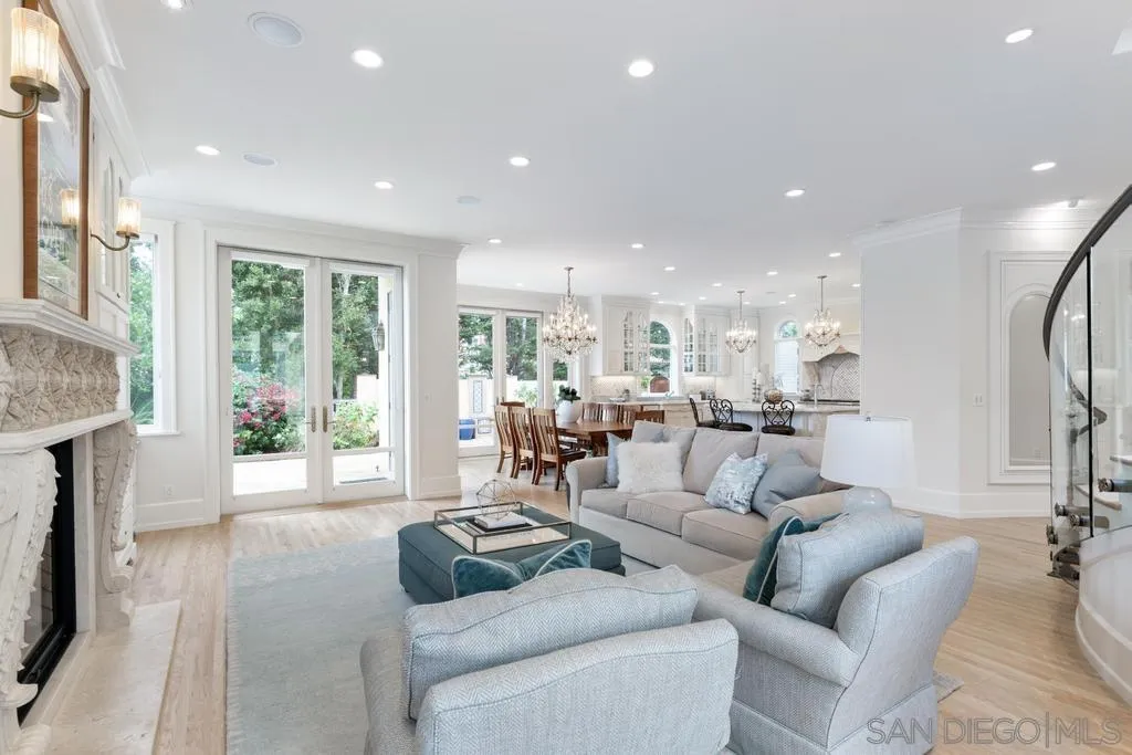 7971 Prospect Place La Jolla, CA 92037 - Photo 12 of 36 a living room with furniture and a large window