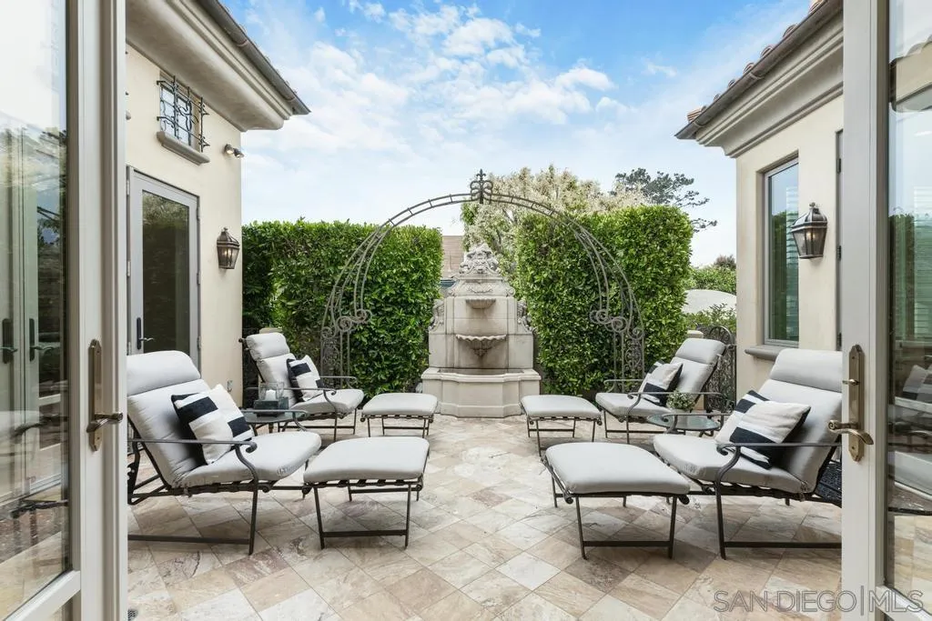 7971 Prospect Place La Jolla, CA 92037 - Photo 6 of 36 a patio with patio couch and table