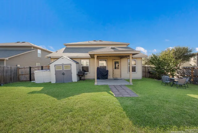 a view of a house with a big yard