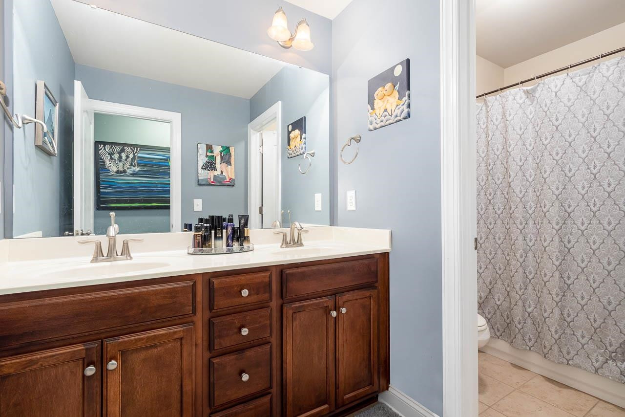 8024 Upper Lake Drive Raleigh, NC 27615 - Photo 15 of 32 Bathroom