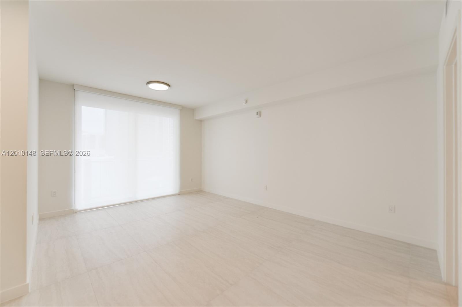 77 Southeast 5th Street, Unit 2604 Miami, FL 33131 - Photo 3 of 47 a view of an empty room