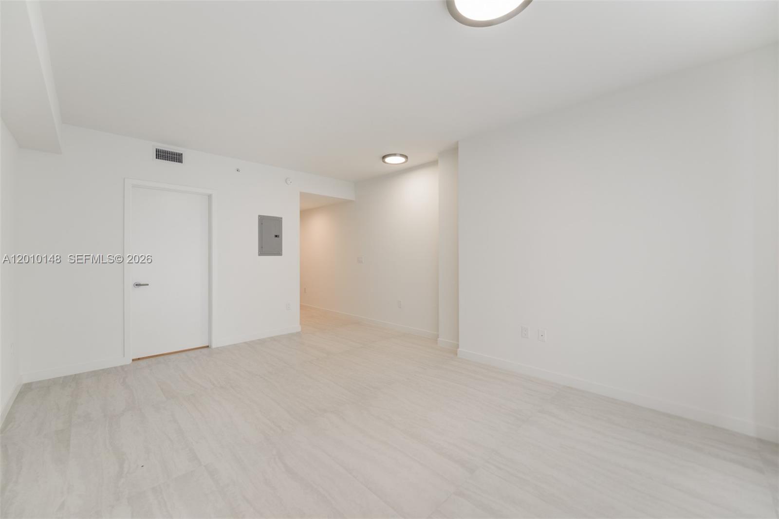 77 Southeast 5th Street, Unit 2604 Miami, FL 33131 - Photo 5 of 47 a view of an empty room