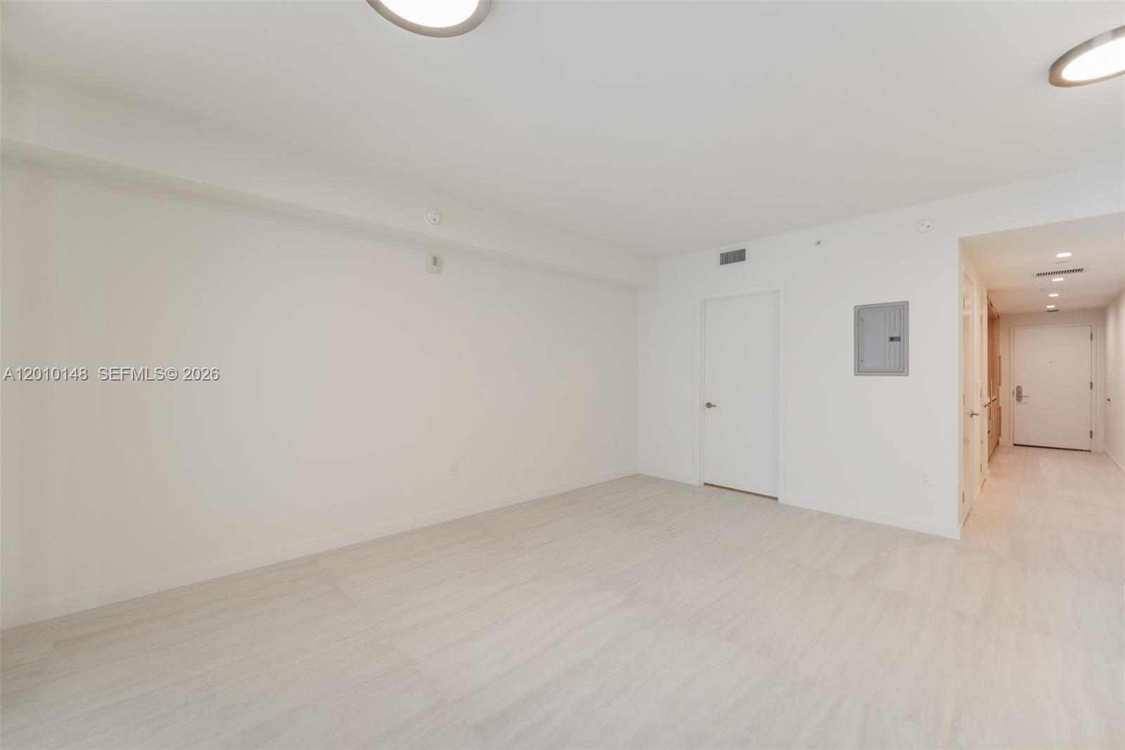 77 Southeast 5th Street, Unit 2604 Miami, FL 33131 - Photo 6 of 47 a view of an empty room