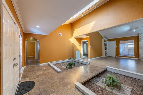 a view of entryway with a front door