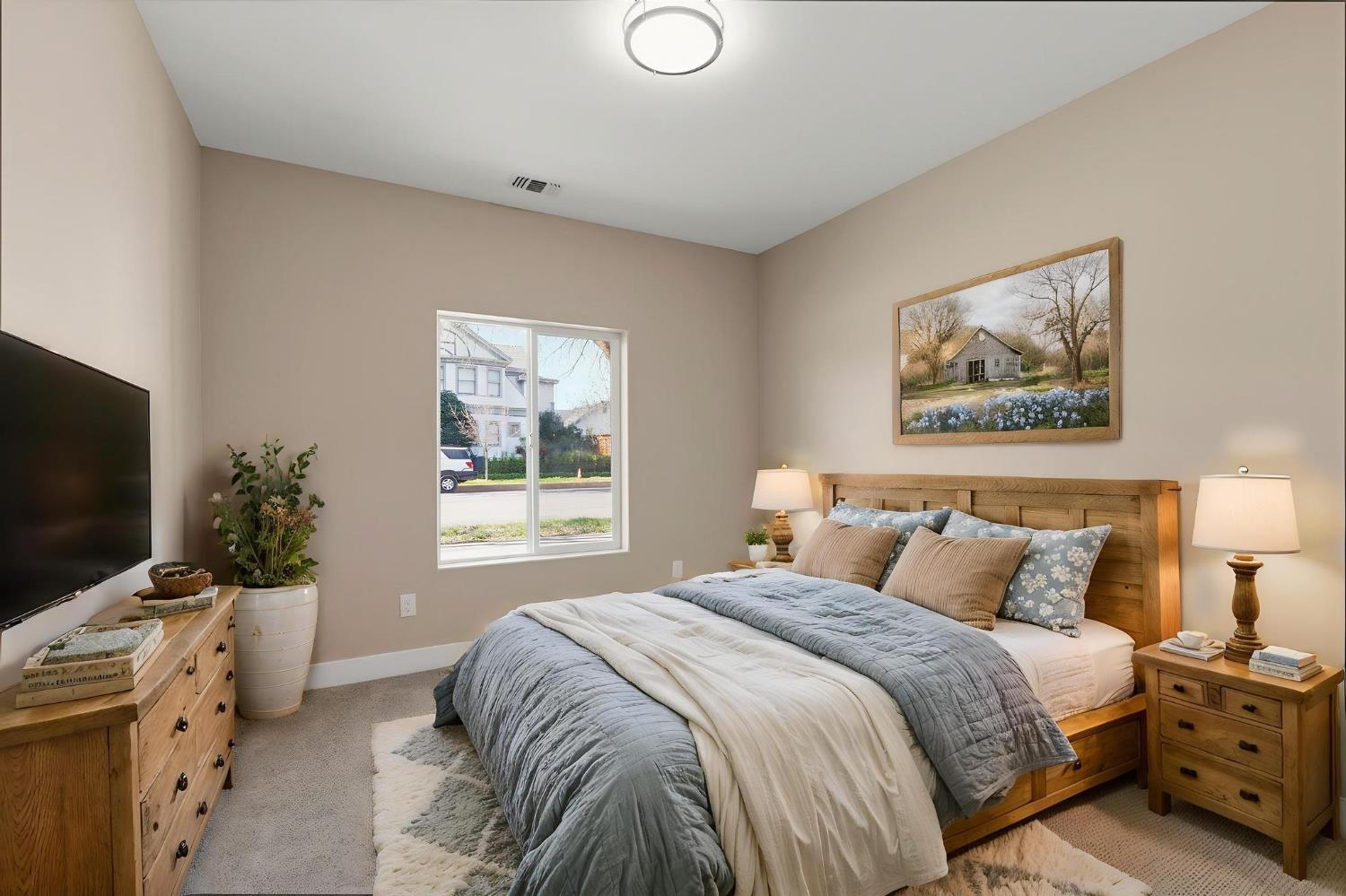 243 7th Street Colusa, CA 95932 - Photo 23 of 34 bedroom with light colored carpet and baseboards