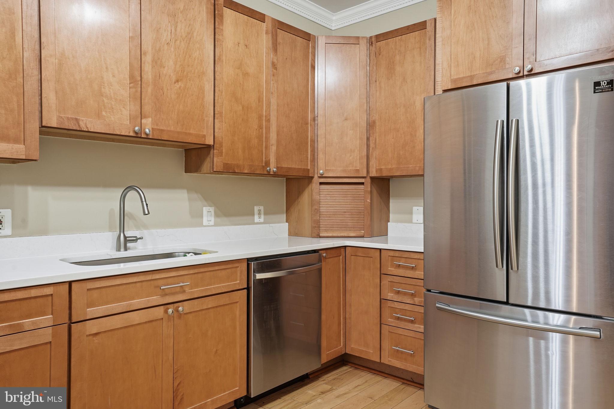 107 West Fort Avenue Baltimore, MD 21230 - Photo 14 of 34 a kitchen with appliances and cabinets