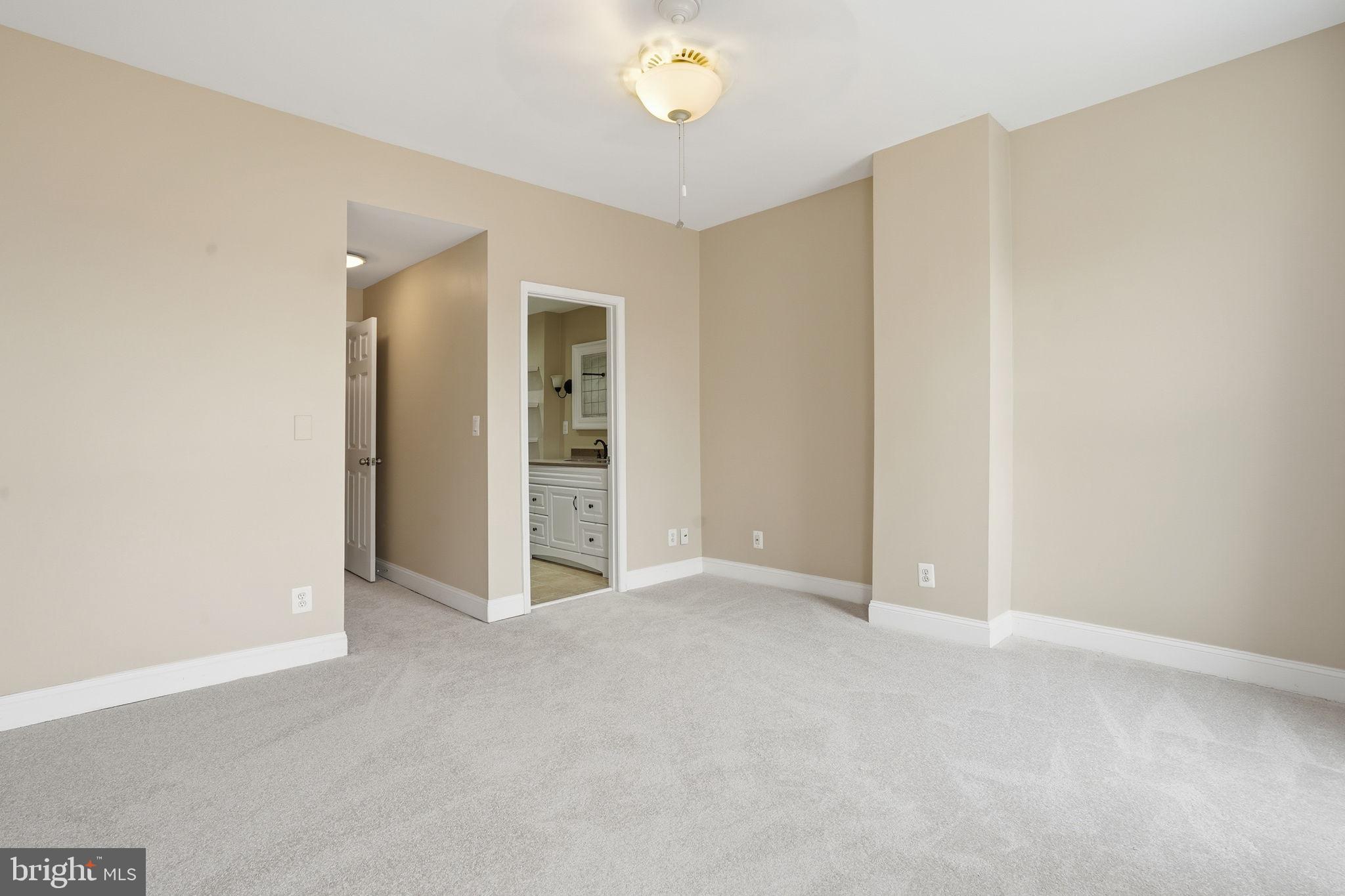 107 West Fort Avenue Baltimore, MD 21230 - Photo 22 of 34 a view of an empty room with a window