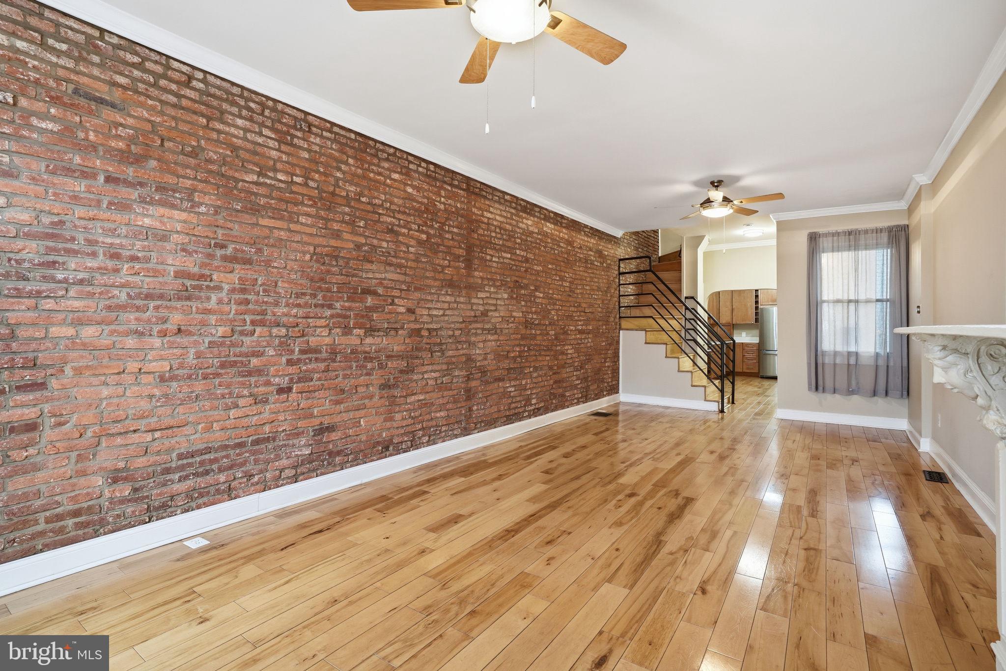 107 West Fort Avenue Baltimore, MD 21230 - Photo 4 of 34 a view of livingroom with wooden floor