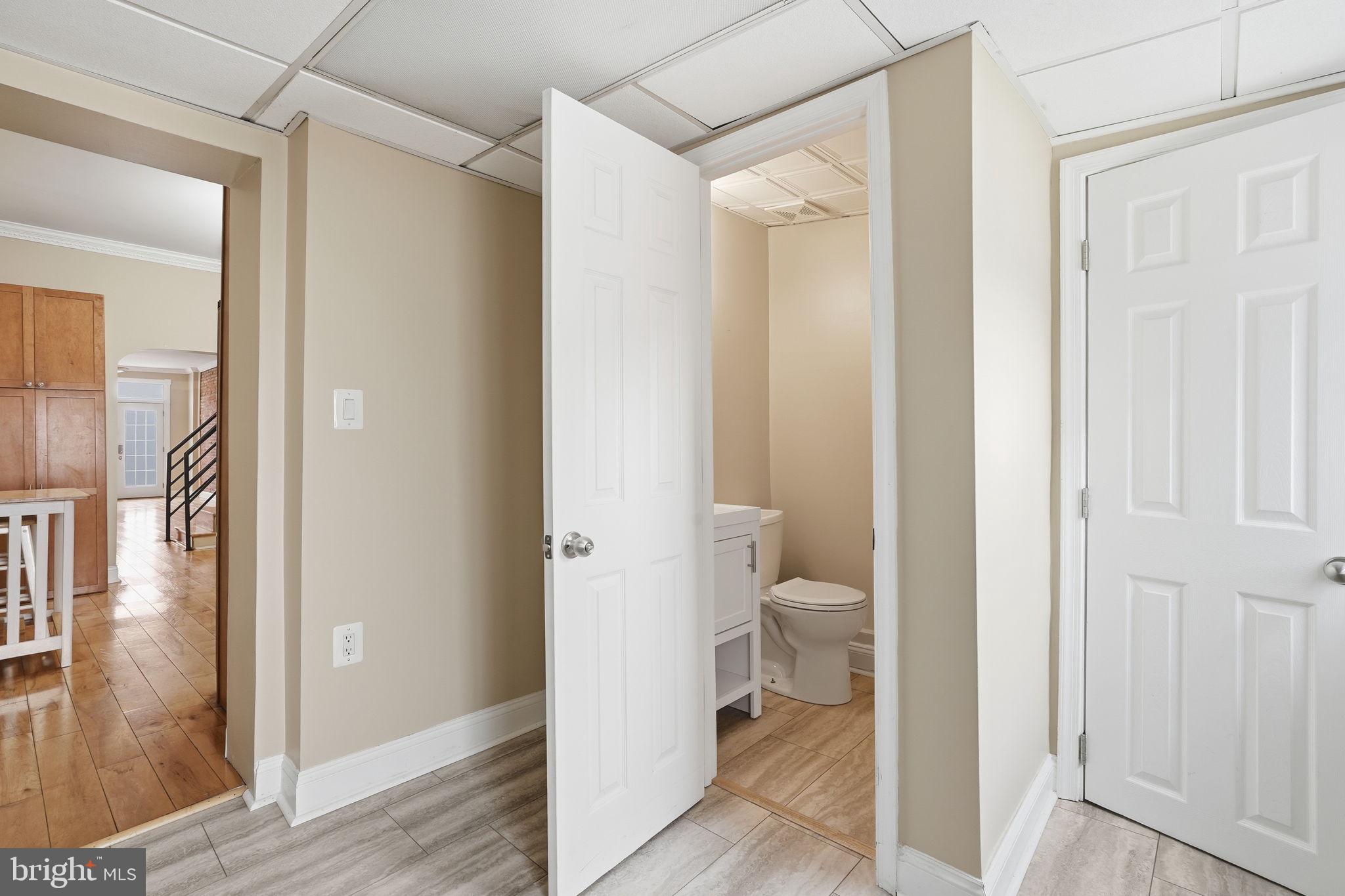107 West Fort Avenue Baltimore, MD 21230 - Photo 9 of 34 a bathroom that has a glass shower door