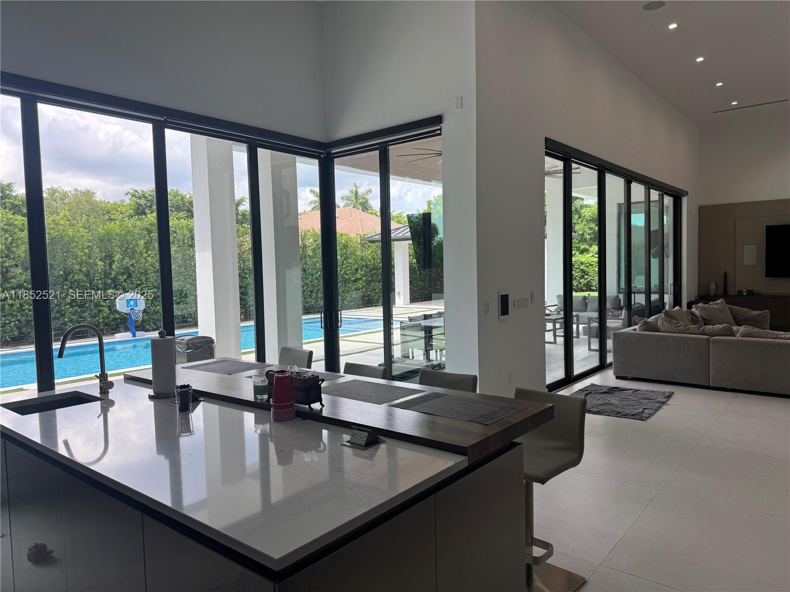 9600 Southwest 66th Street Miami, FL 33173 - Photo 11 of 56 a kitchen with a large window and a sink