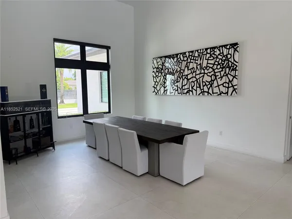 a room with shelves on the wall