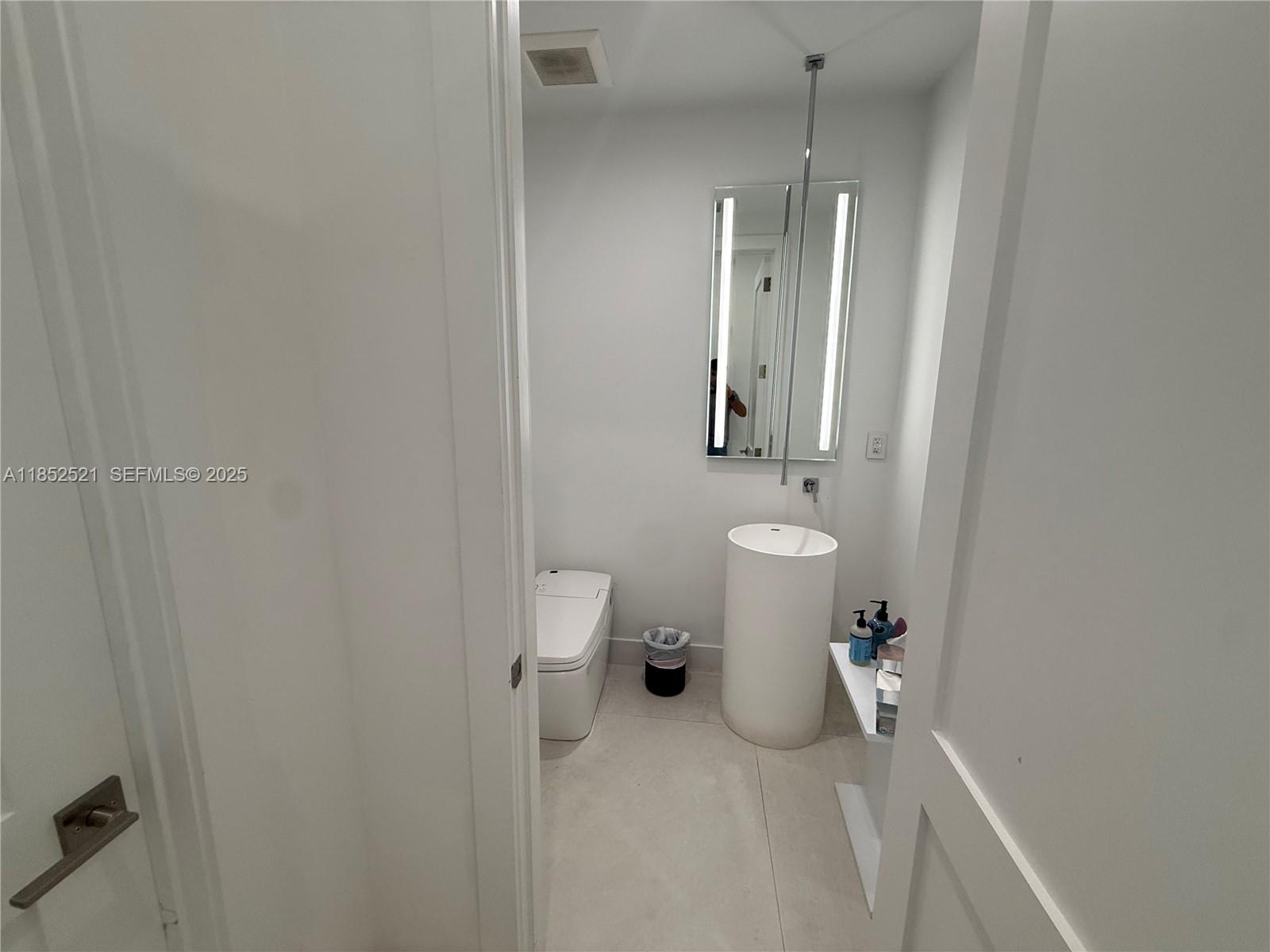 9600 Southwest 66th Street Miami, FL 33173 - Photo 17 of 56 a bathroom with a toilet sink and shower