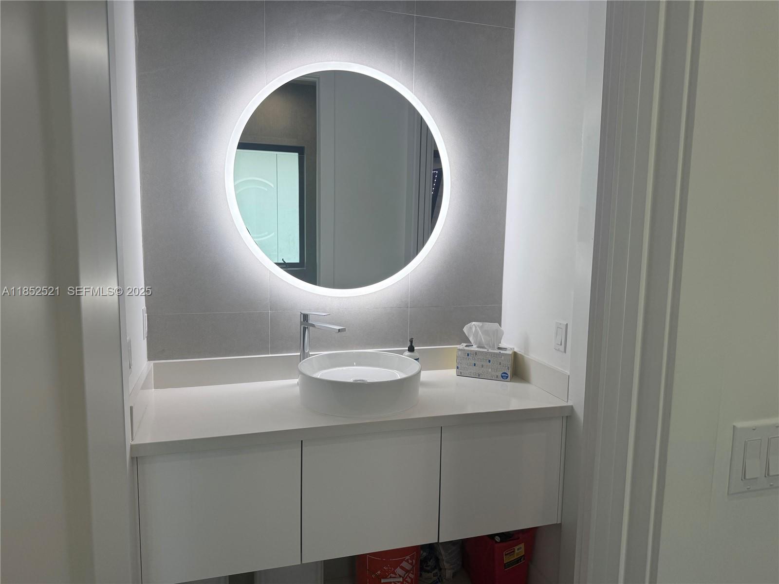 9600 Southwest 66th Street Miami, FL 33173 - Photo 32 of 56 a bathroom with a sink and a mirror