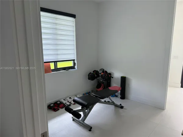 a view of a livingroom with furniture window and outside view