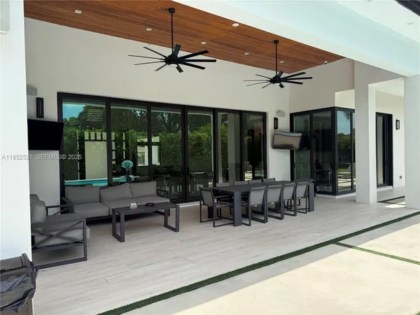 a bathroom with a sink a toilet and a shower