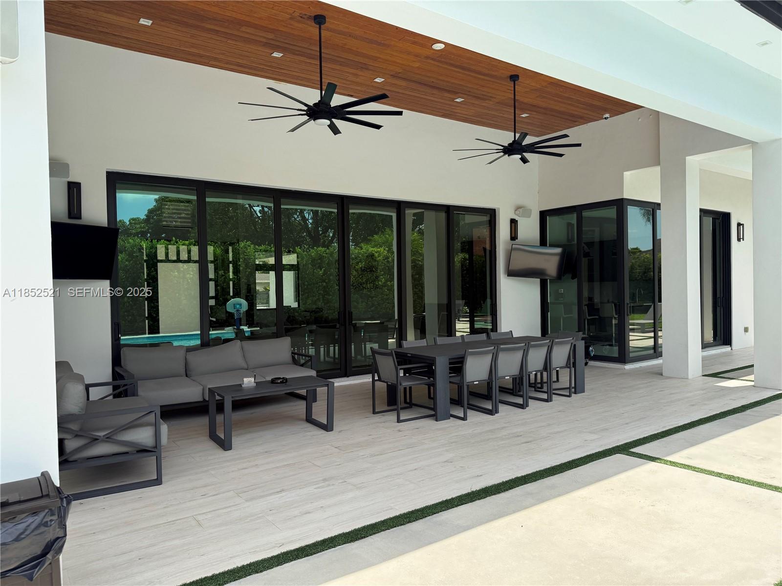 9600 Southwest 66th Street Miami, FL 33173 - Photo 46 of 56 a view of a livingroom with furniture window and outside view
