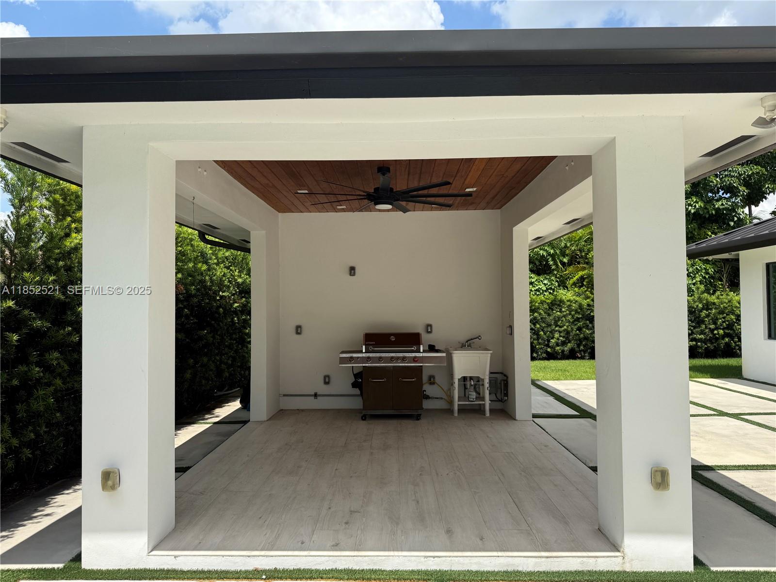 9600 Southwest 66th Street Miami, FL 33173 - Photo 50 of 56 a view of a porch with furniture and front door