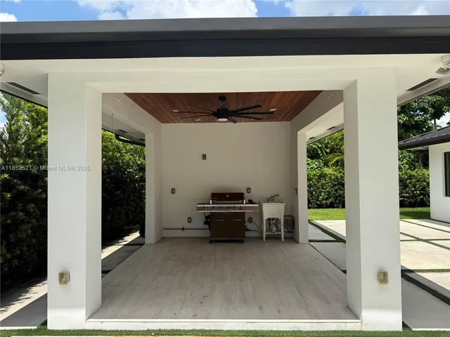 a view of a playground with basketball court