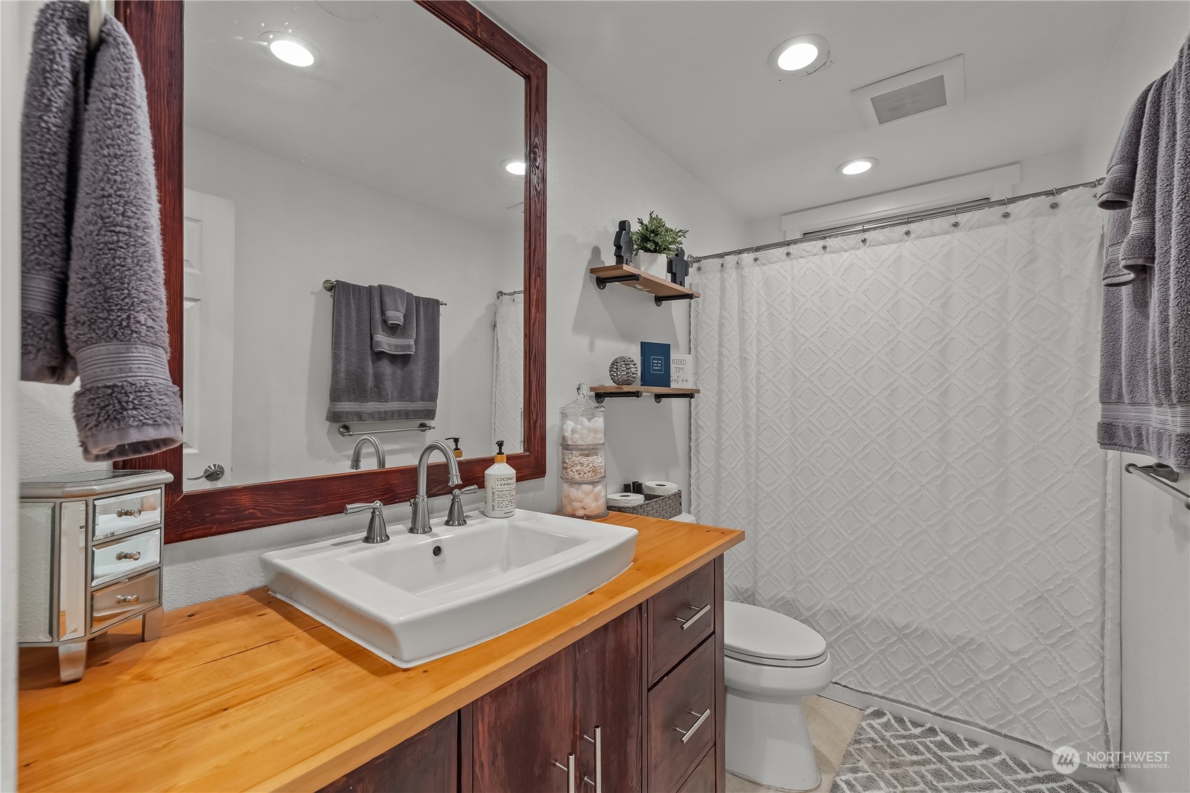 3529 Eagle Drive Northeast Olympia, WA 98516 - Photo 16 of 29 a bathroom with a sink toilet and shower