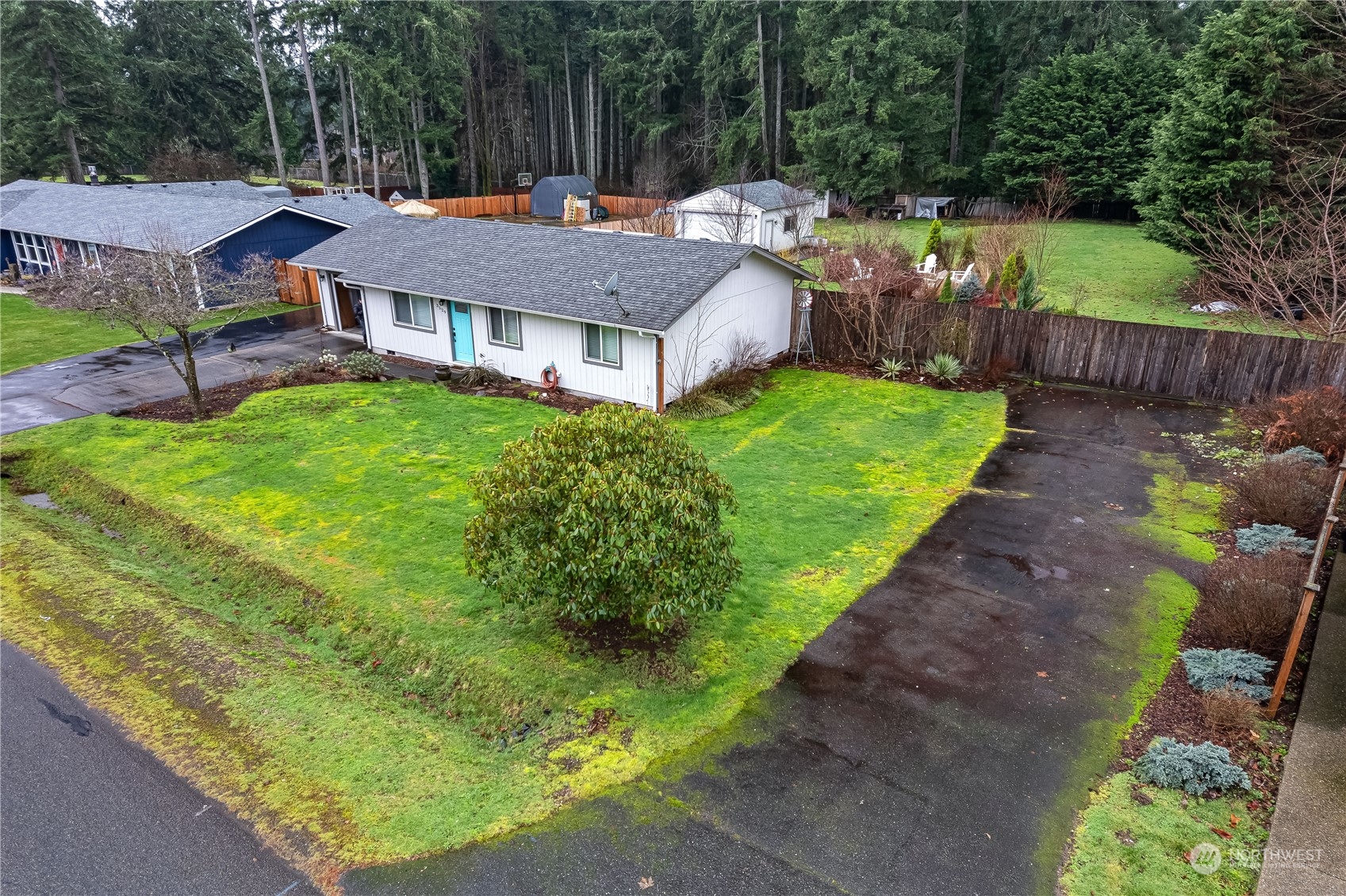 3529 Eagle Drive Northeast Olympia, WA 98516 - Photo 22 of 29 a aerial view of a house with a yard table and chairs