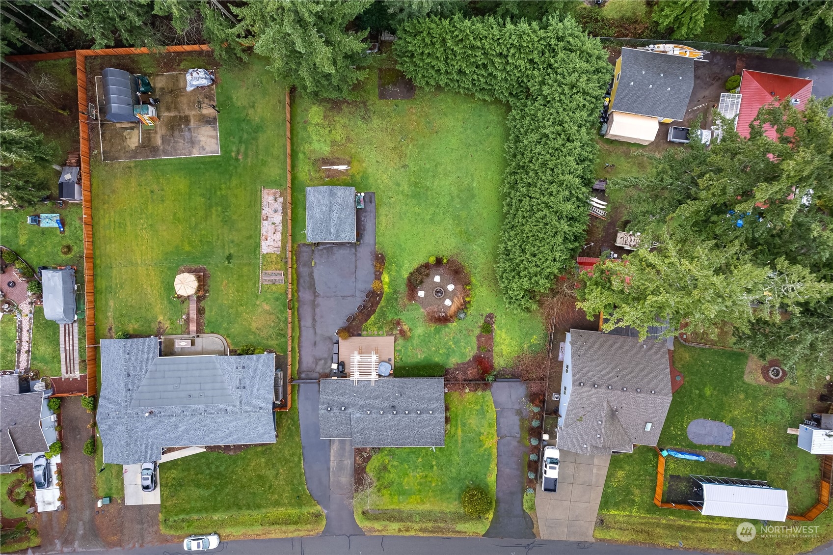 3529 Eagle Drive Northeast Olympia, WA 98516 - Photo 26 of 29 an aerial view of a house with a garden and trees