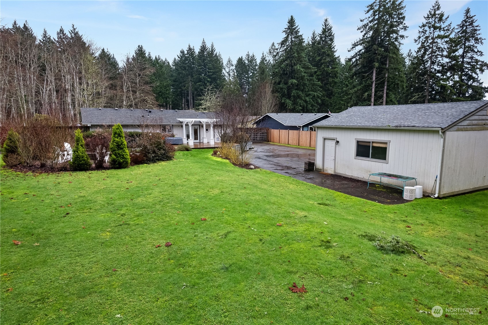 3529 Eagle Drive Northeast Olympia, WA 98516 - Photo 27 of 29 a view of a house with backyard and sitting area