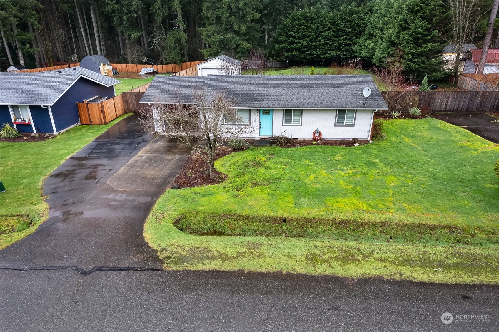 3529 Eagle Drive Northeast Olympia, WA 98516 - Photo 29 of 29 a aerial view of a house with a yard table and chairs