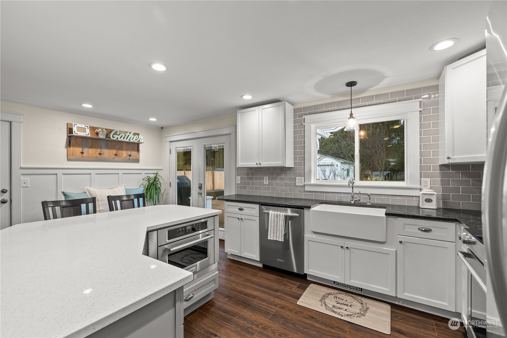 3529 Eagle Drive Northeast Olympia, WA 98516 - Photo 7 of 29 a kitchen with stainless steel appliances a stove sink and cabinets