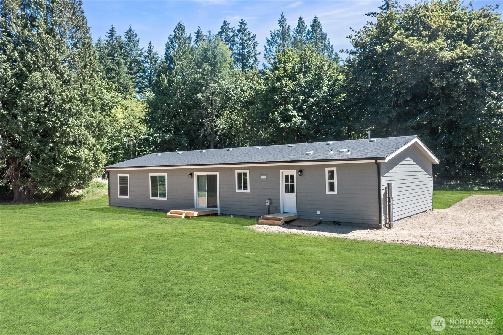 17217 80th Street Southwest Longbranch, WA 98351 - Photo 35 of 39 a view of a house with a yard