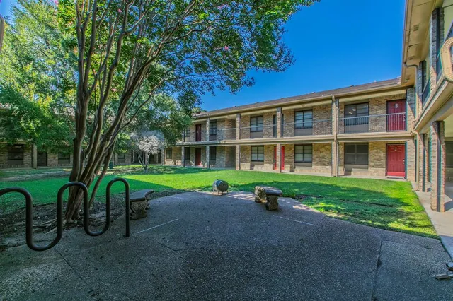 a view of house with outdoor space and entertaining space