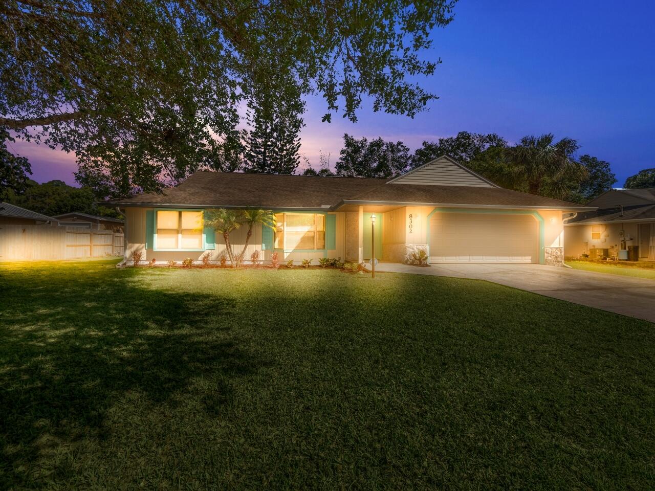 8302 Bayard Road Fort Pierce, FL 34951 - Photo 1 of 17 Front Exterior Night Shot
