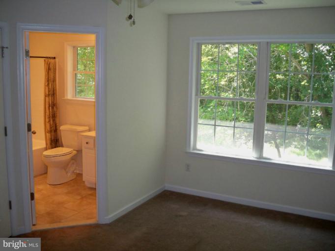 1458 Cox Neck Road Chester, MD 21619 - Photo 13 of 20 a view of a room that has a window