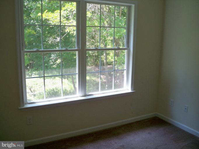 1458 Cox Neck Road Chester, MD 21619 - Photo 14 of 20 a view of a room that has a window